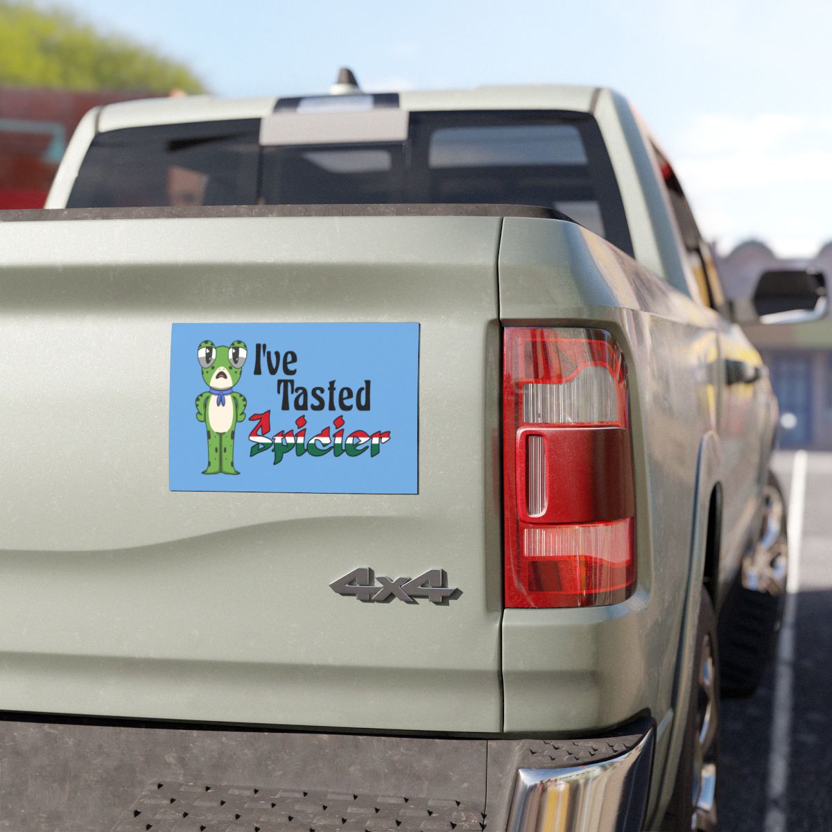 Colorful frog, car bumper sticker, reading 'I've Tasted Spicier' 